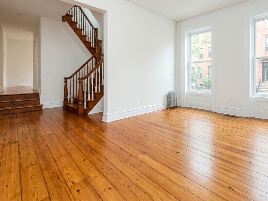 Hardwood Floor Refinishing - East Village walk-up, repaired and refinished pine