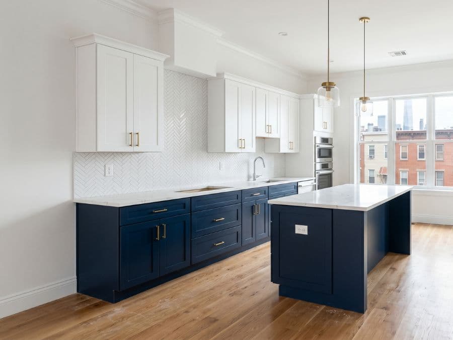Painting - Lower East Side kitchen cabinet refinish, two-tone navy and white