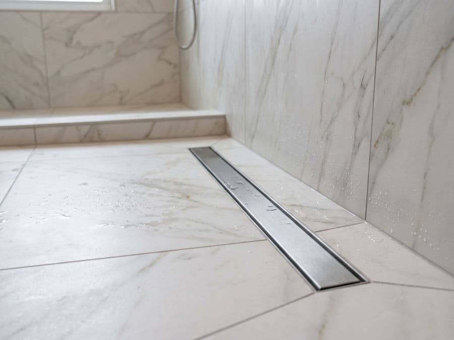 Tile Work - Lower East Side master shower, large format porcelain with linear drain